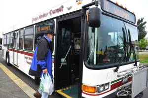 Matthew N. Wells | The Daily World
Eric Wood, of Westport, boards the bus back to Westport on Thursday morning, at Aberdeen Transit Center. Wood was happy to share why he takes the bus and why hell continue to do so, especially now that Grays Harbor Transportation Authority will provide free fares for riders through Dec. 31, 2023.