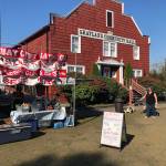 photos by Michael Wagar | The Daily World 
The historic Grayland Community Hall, built in 1930, was the cornerstone of the Cranberry Fest in Grayland this past weekend. Vendor Bay City Sausage, pictured at left, was selling cranberry hotdogs.