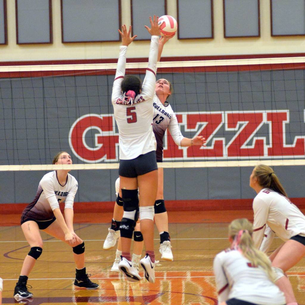 RYAN SPARKS | THE DAILY WORLD
Montesano senior middle blocker Addie Winter (13) shots a drop shot over Hoquiam's Chloe Kennedy (5) on Tuesday in Hoquiam.