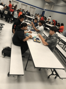 Lake Quinault School District students sit at new cafeteria tables gifted by the Grays Harbor Community Foundation.