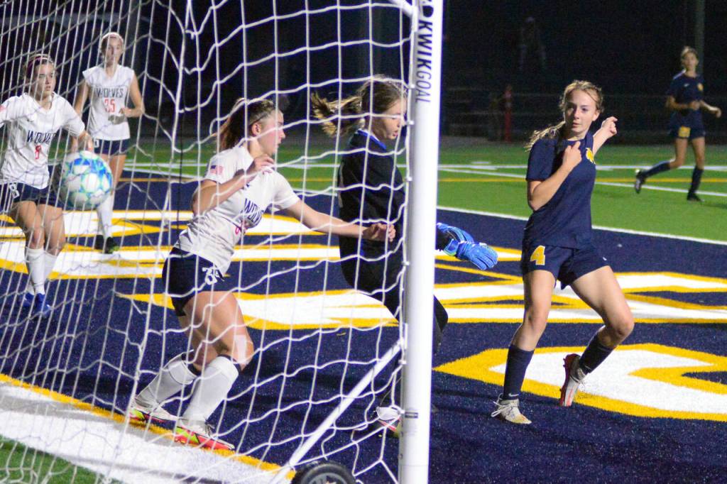 RYAN SPARKS | THE DAILY WORLD Aberdeen forward Annie Troeh (4) chips in a shot for a goal during the Bobcats 4-1 win on Thursday, Oct. 13, 2022 at Stewart Field in Aberdeen.