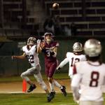 PHOTO BY BEN WINKELMAN Hoquiam senior receiver Owen McNeill (3) makes a touchdown catch while being defended by Montesanos Bode Poler (22) during the Bulldogs 47-6 victory on Friday at Olympic Stadium in Hoquiam.