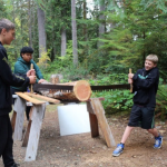 Aberdeen sixth-grade students learn how to use a two-man crosscut saw and study why the shape of the teeth contributes to the saws performance as part of math and science lessons at the Outdoor School at the YMCAs Camp Bishop on Lost Lake the week of Oct. 4-7. Photos courtesy Aberdeen School District