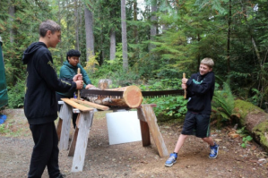 Aberdeen sixth-grade students learn how to use a two-man crosscut saw and study why the shape of the teeth contributes to the saws performance as part of math and science lessons at the Outdoor School at the YMCAs Camp Bishop on Lost Lake the week of Oct. 4-7. Photos courtesy Aberdeen School District