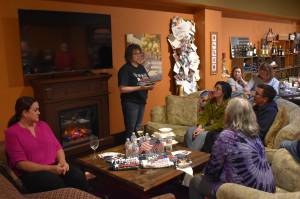 Incumbent nonpartisan candidate Vickie Raines spoke to attendees about her more than two decades of experience in public office and why voters should trust her to combat the current issues facing the Harbor on Thursday, Oct. 13 during a Meet and Greet at Grays Harbor Wine Sellars, in Aberdeen. (Allen Leister | The Daily World)
