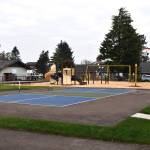 Matthew N. Wells | The Daily World 
After many people put in hours and hours of manual labor at Highland Park in Cosmopolis, heres a view of what part of the park looked like on Monday, Oct. 17. The freshly-laid grass, flat and paved blacktop for future basketball and racquetball games, and a clean play area complete with fresh playground chips, offers a view of what Grays Harbor residents  of all ages and abilities  will be able to enjoy once the park is open to the public.