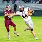 PHOTO BY SHAWN DONNELLY Montesanos Gabe Bodwell (44) is chased by Hoquiams Zander Jump in a game from earlier this season. Monte will face Elma in the East County Civil War while Hoquiam takes on No. 6 Eatonville in the final week of the prep football regular season.