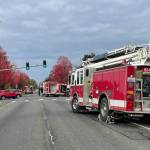 Sumner Avenue was briefly closed as local fire departments responded to a residential structure fire on Thursday. (Michael S. Lockett / The Daily World)