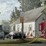 Michael S. Lockett / The Daily World
Smoke was still visible from a residential structure fire in Hoquiam on Thursday.