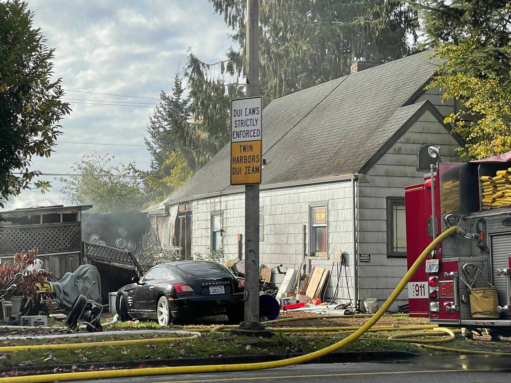 Michael S. Lockett / The Daily World
Smoke was still visible from a residential structure fire in Hoquiam on Thursday.