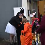 Children and teenagers lined up and down Main Street to collect candy from outside local businesses or from booths set up nearby. Over 20 businesses and organizations handed out candy during the Elma Fall Festival on Halloween.