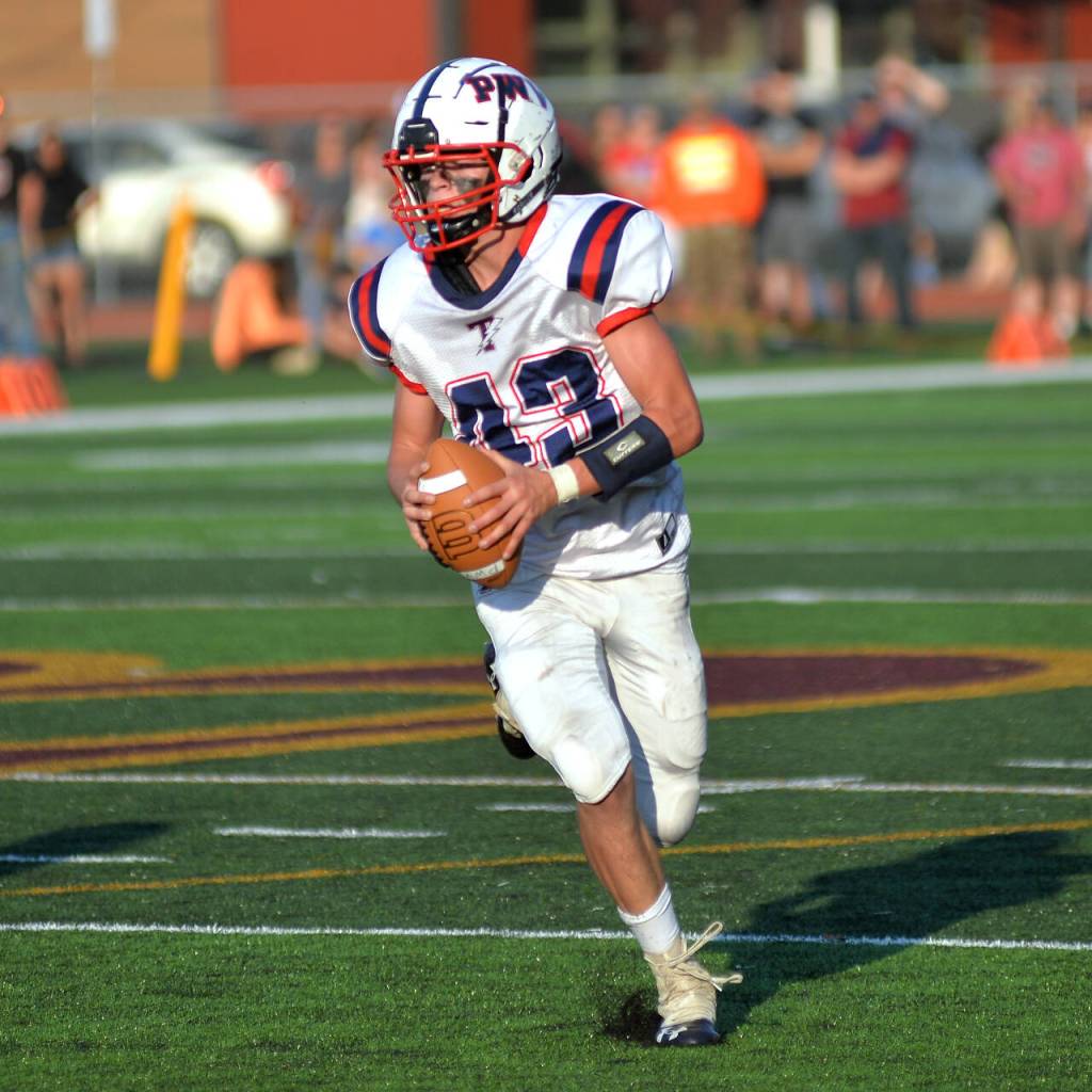 RYAN SPARKS / THE DAILY WORLD Pe Ell-Willapa Valley quarterback Kolten Fluke and the Titans will host Adna in a 2B district crossover playoff game on Friday in Menlo.