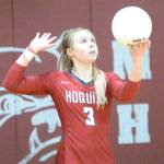 RYAN SPARKS | THE DAILY WORLD Hoquiam senior Ella Folkers readies a serve during the Grizzlies straight-set loss in a 1A District 4 Tournament semifinal game on Wednesday in Montesano.