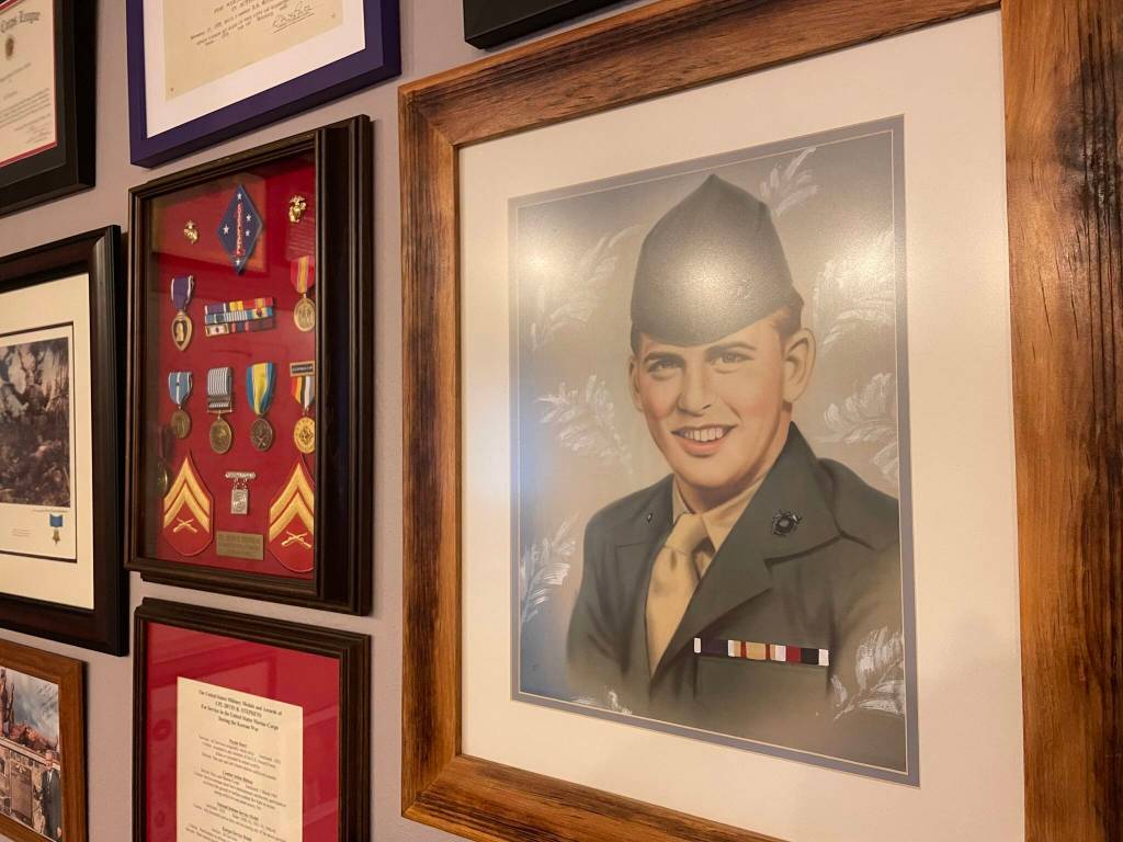 A photo of Irv Stephens is placed alongside his decorations earned in the service, including his corporals stripes and a Purple Heart issued for wounds received at the Battle of the Chosin Reservoir. (Michael S. Lockett / The Daily World)