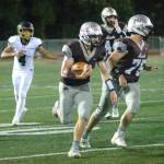 RYAN SPARKS / THE DAILY WORLD 
Montesano quarterback Jayden McElravy carries the football during the Bulldogs 47-7 win over Seton Catholic in a 1A district crossover game on Friday, Nov. 4, in Montesano. McElravy had 266 yards and three touchdowns in the win.