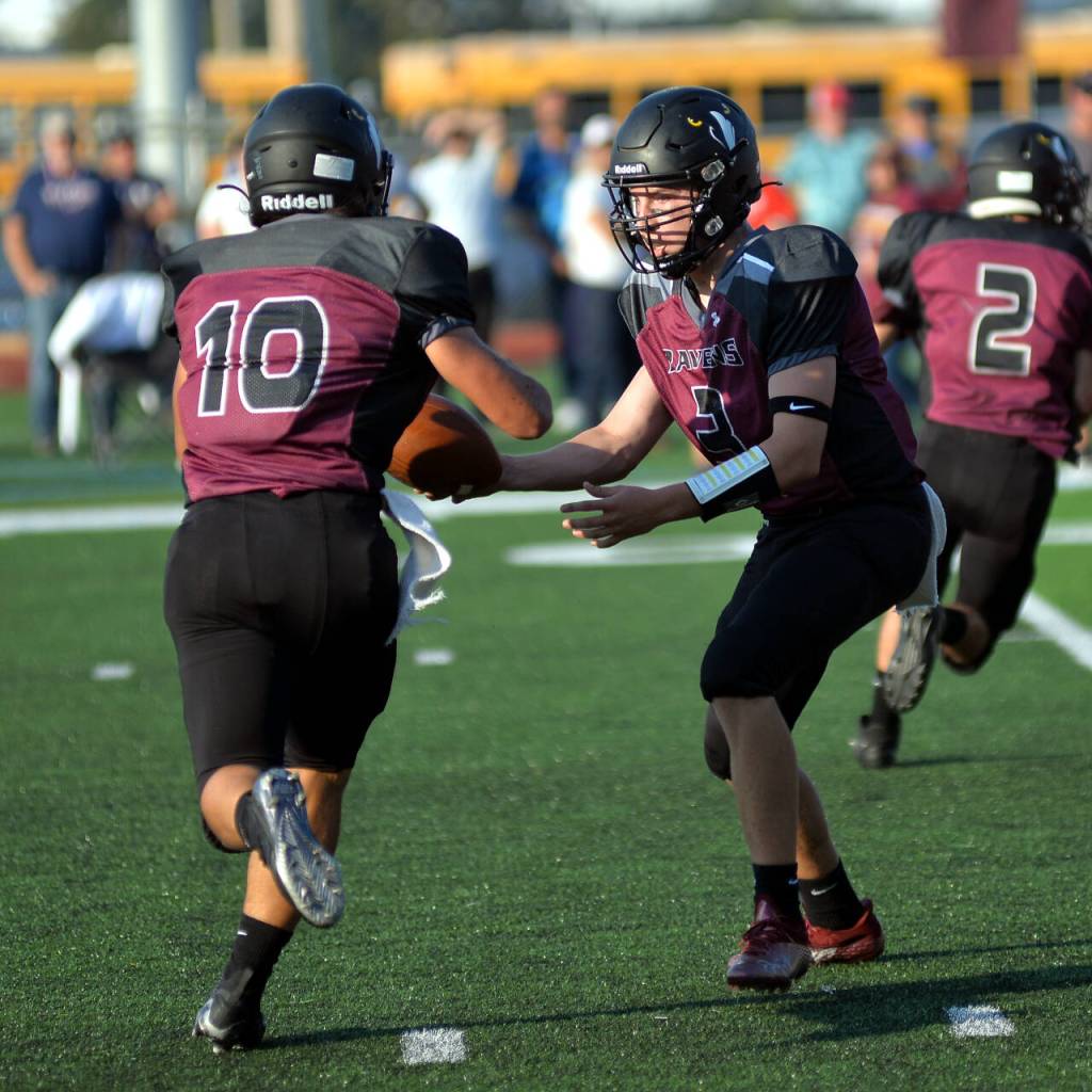 DAILY WORLD FILE PHOTO 
Raymond-South Bend quarterback Austin Snodgrass and running back Ferrill Johnson (10)  seen here in a game on Oct. 15  will lead the Ravens into a first-round 2B state playoff game against Goldendale on Friday in South Bend.