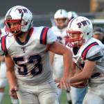 DAILY WORLD FILE PHOTO 
Pe Ell-Willapa Valley Titans Garrett Keeton (53) and Blake Howard (32) were named to the 2B Central-North League First Team on Tuesday.