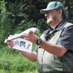 Fish biologist Curt Holt holds a Pacific Lamprey replica during a talk in the field.
WDFW photographs