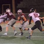 RYAN SPARKS / THE DAILY WORLD Montesano running back Ethan Blundred (7) carries the football during the Bulldogs 24-22 state-tournament win over Toppenish on Friday in Montesano.