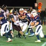 RYAN SPARKS | THE DAILY WORLD Pe Ell-Willapa Valley running back Blake Howard, right, rushed for a game-high 120 yards in the Titans 34-13 win over Raymond-South Bend in a 2B State quarterfinal game on Friday in Montesano.