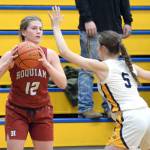 RYAN SPARKS | THE DAILY WORLD Hoquiam senior Ashlinn Cady (12) looks to inbound the ball while defended by Aberdeens Mija Hood (5) during the Grizzlies 45-38 loss on Thursday, Dec. 1, 2022 at Sam Benn Gym in Aberdeen.
