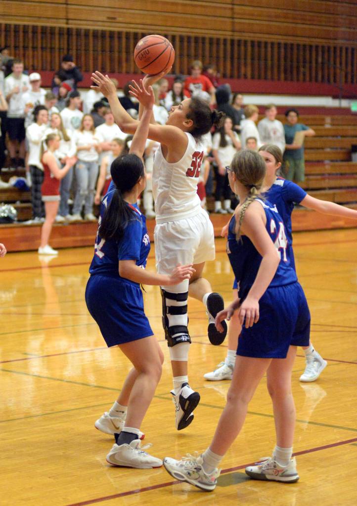 RYAN SPARKS | THE DAILY WORLD Hoquiam senior Chloe Kennedy (32) scores two of her game-high 22 points in a 50-32 victory over Willapa Valley on Wednesday in Hoquiam.