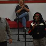 Ruthie Bolton, right, gave a short speech to the crowd at Taholah school Wednesday evening alongside Jon Claymore, superintendent of Taholah schools. (Clayton Franke / The Daily World)