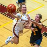 PHOTO BY ERIC TRENT South Bend senior guard Elli Capps (2) drives to the bucket during a home game against Forks on Friday at Koplitz Field House in South Bend.