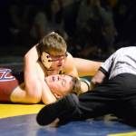 RYAN SPARKS / THE DAILY WORLD
Aberdeen senior Jack Dore, top, peers through his headgear while working to pin Hoquiam senior Logan Avery in the 138-pound match of Aberdeens 63-18 dual-meet victory on Tuesday in Aberdeen.