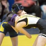 RYAN SPARKS | THE DAILY WORLD Aberdeens Alondra Santibanez, left, grapples with Llincolns Olivia Mounts during the 100-pound final of the Grays Harbor Championships on Saturday in Aberdeen.