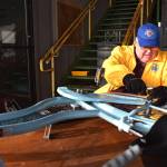 Matthew N. Wells / The Daily World 
Bob Braden, whos been a member of the Aberdeen Lions Club for many years, works on a bicycle in need of a couple more tweaks than the other bikes that the clubs program Bicycles from Heaven, provided on Saturday. The program joins the Lions Club, Salvation Army, which handles the application process, and Stafford Creek Corrections Center. The inmates sand, paint, and do other needed fixes in order to refurbish the bicycles. Braden usually handles the final tweaks to give the children and teens a smooth ride.