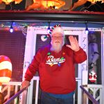 Kevin Farley, who won the Montesanos Chamber of Commerces Griswold Winner award this year, gives a friendly wave. Farley finished his second year of decorating his yard and the exterior of his home  which sits at the corner of West McBryde Avenue and North 1st Street. Farley loves to decorate during the holidays and his favorite thing is seeing his neighbors smiles when they see his hard work.