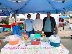 Grays Harbor County Public Health
From left: Talia Hernandez, Mina Fontenelle and Carmela Lopez pose as they celebrate World Breastfeeding Week in August at the Aberdeen Sunday Market.