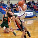 RYAN SPARKS | THE DAILY WORLD Willapa Valleys Wil Clements, right, is called for a charging foul against Morton-White Pass guard Judah Kelly during the Vikings 47-27 loss in the 15th Annual Jack Q. Pearson Holiday Classic on Thursday in Menlo.