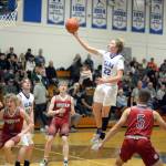 RYAN SPARKS | THE DAILY WORLD Elma guard Cason Seaberg (22) scores on a finger roll during the Eagles 63-53 win over Hoquiam on Wednesday at Elma High School.
