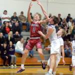 RYAN SPARKS | THE DAILY WORLD Hoquiams Zander Jump (11) puts up a shot against Elmas AJ Holmes during the Eagles 63-53 win on Wednesday at Elma High School.