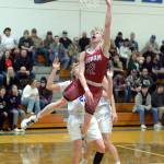 RYAN SPARKS | THE DAILY WORLD Hoquiam guard Michael Lorton Watkins (12) scores on a breakaway layup during the Grizzlies 63-53 loss to Elma on Wednesday at Elma High School.