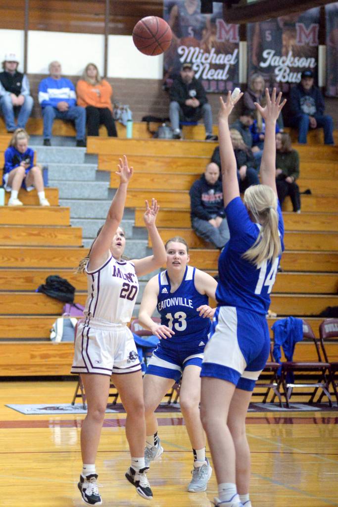 RYAN SPARKS | THE DAILY WORLD Montesano guard Jordan Karr (20) puts up a shot against Eatonvilles Lillian Bickford (14) during the Bulldogs 64-14 win in a 1A Evergreen League game on Thursday in Montesano.