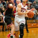 PHOTO BY FOREST WORGUM Hoquiams Justice Stankavich, right, drives to the basket during the Grizzlies 62-47 loss to Tenino on Friday in Hoquiam.