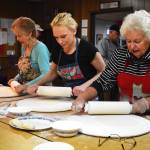 Matthew N. Wells / The Daily World
Janie Valentine, Andrea Krause and Barbara Jorgenson, from left, work up some sweat equity as they lovingly flatten lefse  a product of potato, flour, water, milk and butter  in preparation for the Sons of Norway Grays Harbor dinner on Sunday afternoon, Jan. 15, at the nonprofit organizations building at 717 Randall St. in Aberdeen. The three women were part of a group of about 20 people on Tuesday who were making the Norwegian flatbread.