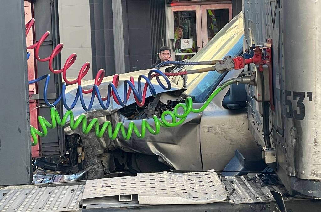 Damage to a pickup truck struck by a semi-truck running a red light in downtown Aberdeen on Wednesday, Jan. 11 is clearly visible. (Michael S. Lockett / The Daily World)