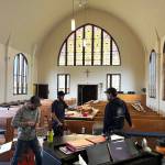 Matthew N. Wells / The Daily World 
Workers from Cathedral Crafts Stained Glass Company, out of Winona, Minnesota, work in order to complete the restoration of the 99-year-old stained glass windows at Amazing Grace Lutheran Church of Grays Harbor. The clear windows on the left side show the unfinished bits of restoration, which should be completed this week.