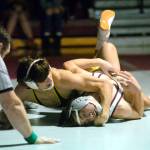 RYAN SPARKS | THE DAILY WORLD Aberdeens Aiden Watkins, top looks to pin Montesanos Gage Stutesman during a dual meet on Wednesday at Bo Griffith Memorial Gymnasium in Montesano.