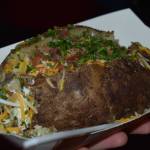 Hundreds of freshly baked potatoes with all the fixings were available to all guests for $5 during the Baked Potato Feed and Dollar Auction fundraiser for the Grays Harbor Timberwolves on Saturday, Jan. 21, in Aberdeen. (Allen Leister / The Daily World)