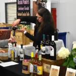 Allen Leister / The Daily World 
Over 20 wine tasting vendors from notable wineries in Western and Eastern Washington were present at the 14th annual Elma Winter Wine Festival on Saturday, Jan. 21. Guests were given samples of a variety of different wine blends thoughout the venue.