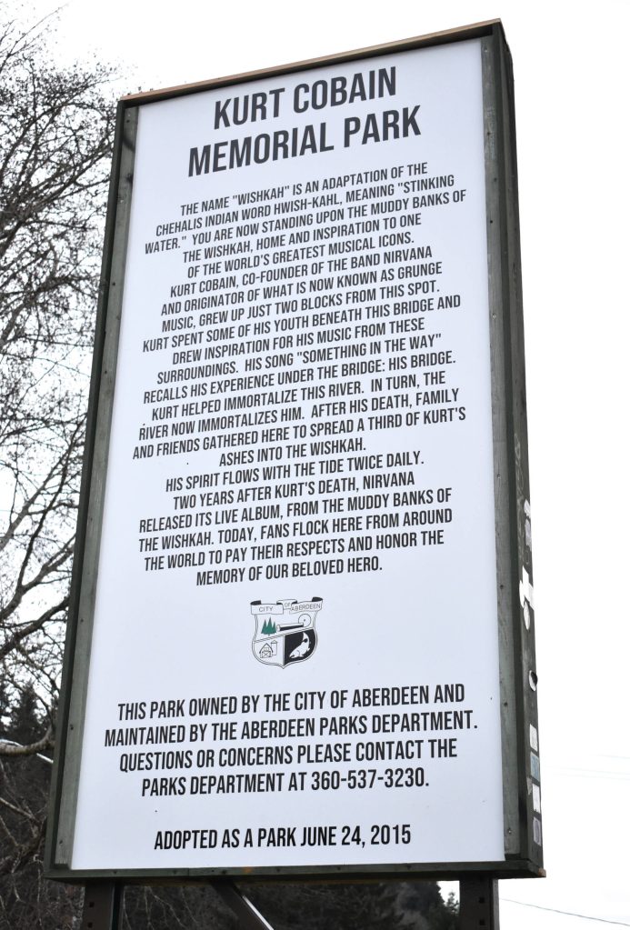 The two-sided sign, which shows Kurt Cobains face and his birth and death dates, explains how the Young Street Bridge and the Muddy Banks of the Wishkah, over which the bridge flows, are home and inspiration to one of the worlds greatest musical icons. The ownership of the park, dedicated April 5, 2011, was turned over to the city of Aberdeen in 2015. Black markings from this side of the sign have recently been washed off of the sign to the chagrin of some fans. (Matthew N. Wells / The Daily World)