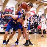ALEC DIETZ | THE CHRONICLE Mossyrock guard Keegan Kolb looks to an official for a foul call after getting tangled up with Willapa Valleys Derek Fluke during Valleys 51-49 win on Friday at Mossyrock High School.