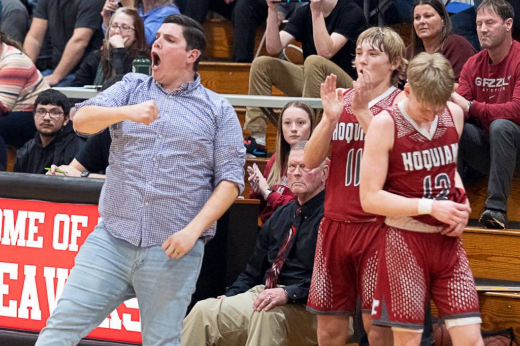 Hoquiam head coach Jeff Niemi cheers as time runs out on the Grizzlies’ 47-33 win in Tenino in late January.
(The Chronicle file photo)