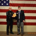 Courtesy of Ocean Shores VFW
Sgt. Chris Iversen receives Police Officer of the Year award Monday from Ocean Shores VFW Post 8956 Commander Sam Nation.