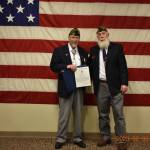 Courtesy of Ocean Shores VFW
 Mike Harris receives Veteran of the Year award from Ocean Shores VFW Post 8956 Commander Sam Nations.